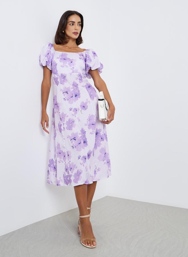 ستايلي فستان ميدي بحافة واسعة وطبعة زهور - Image 1